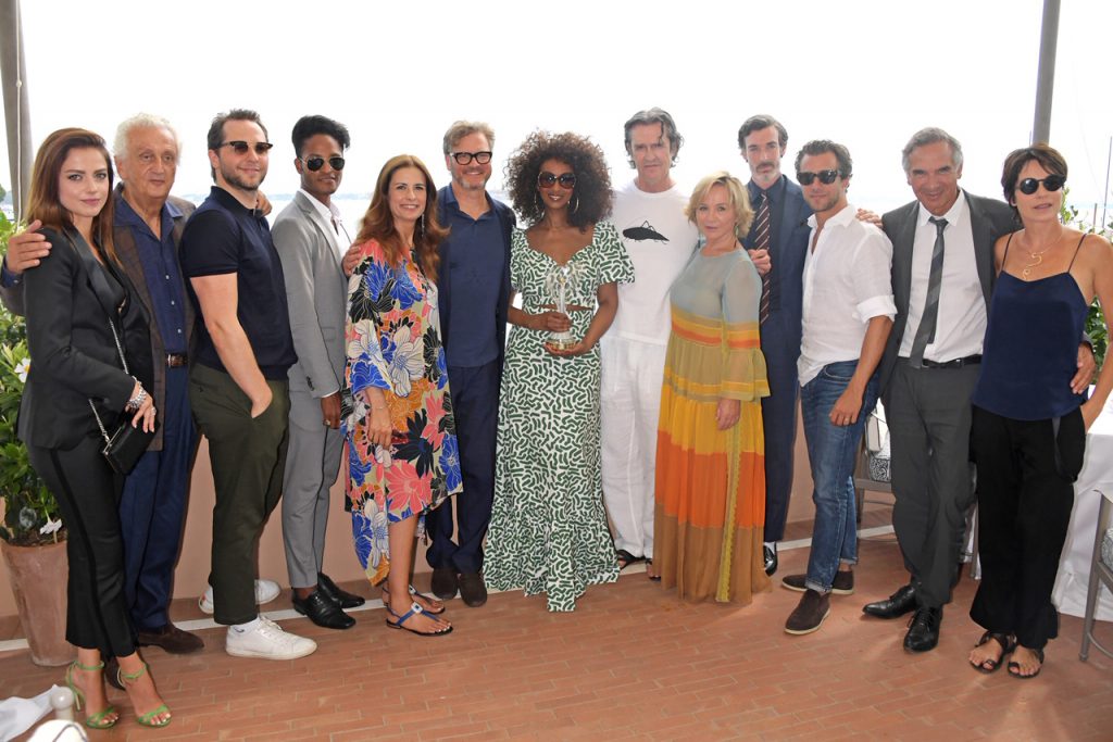 VENICE, ITALY - AUGUST 28: (L to R) Annalisa, Fabrizio Servente, Derek Blasberg, Fernando Montano wearing Tommy Hilfiger, Livia Firth, Colin Firth, Iman, Rupert Everett, Alberta Ferretti, Richard Biedul wearing Tommy Hilfiger, Francesco Carrozzini, Carlo Capasa and Stefania Rocca attend The Green Carpet Fashion Awards lunch, hosted by CNMI and Eco-Age, at Belmond Cipriani Hotel on August 28, 2019 in Venice, Italy. (Photo by David M. Benett/Dave Benett/Getty Images for Eco-Age)